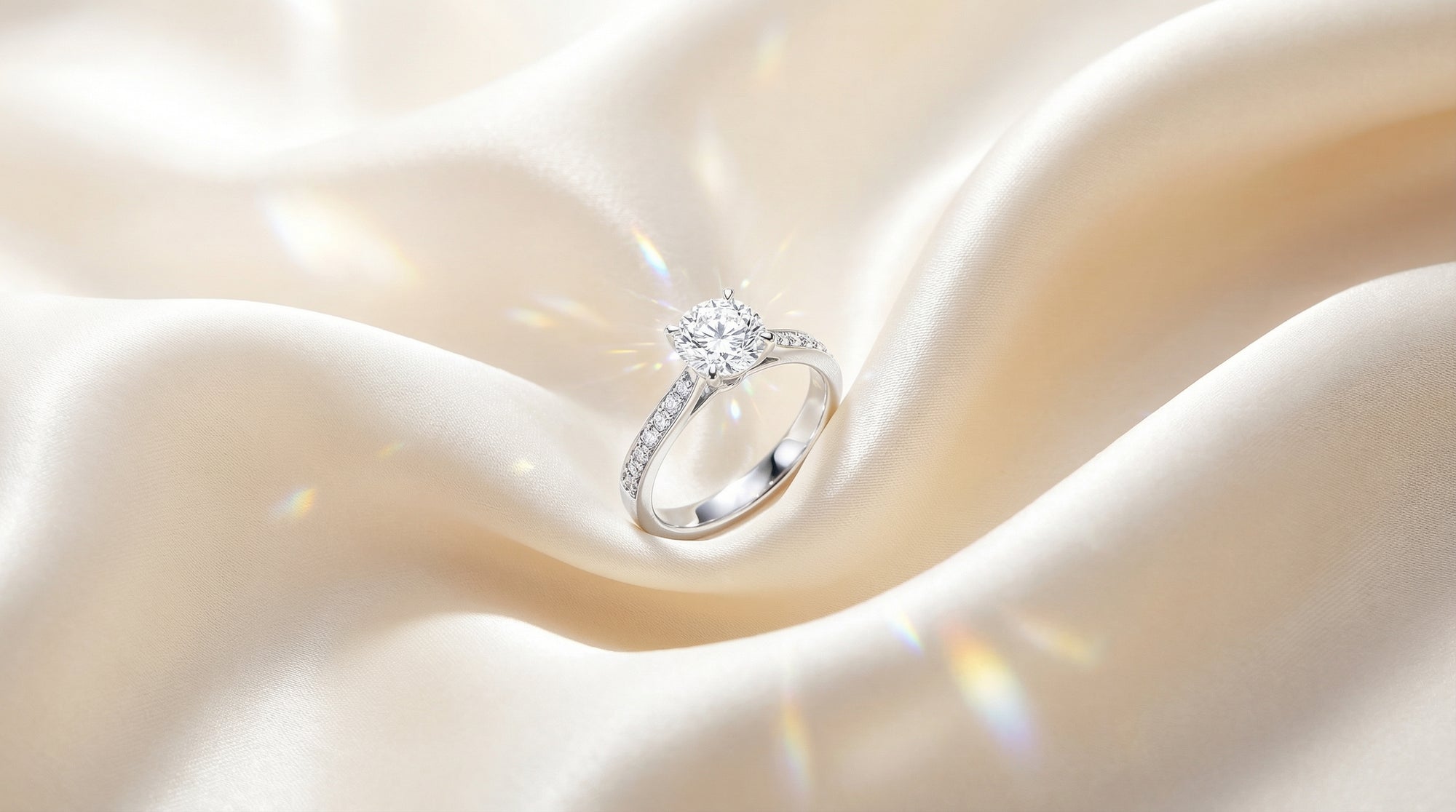 Silver ring with a diamond on a soft, light background