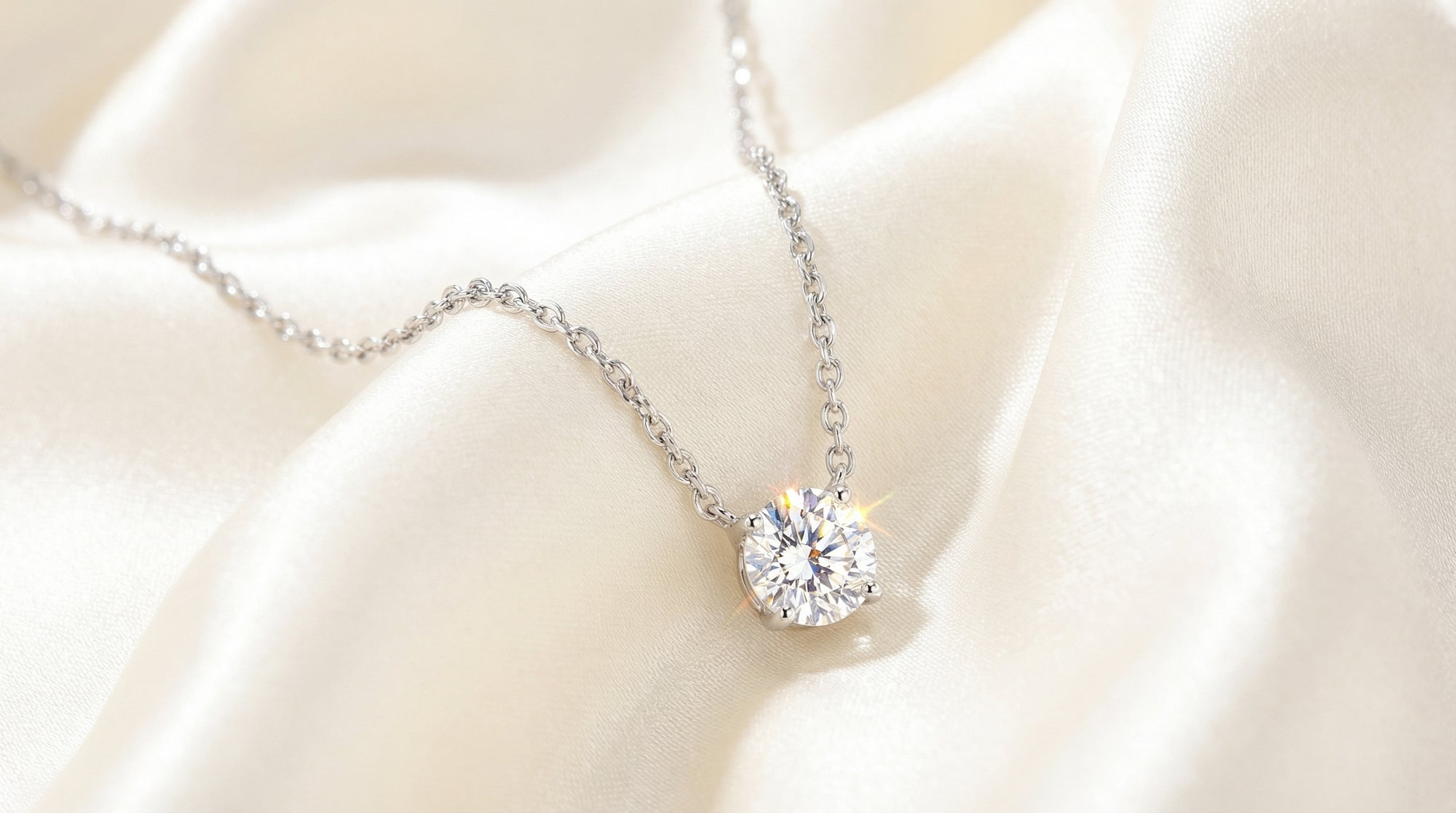Diamond necklace on a mannequin bust with a soft beige background