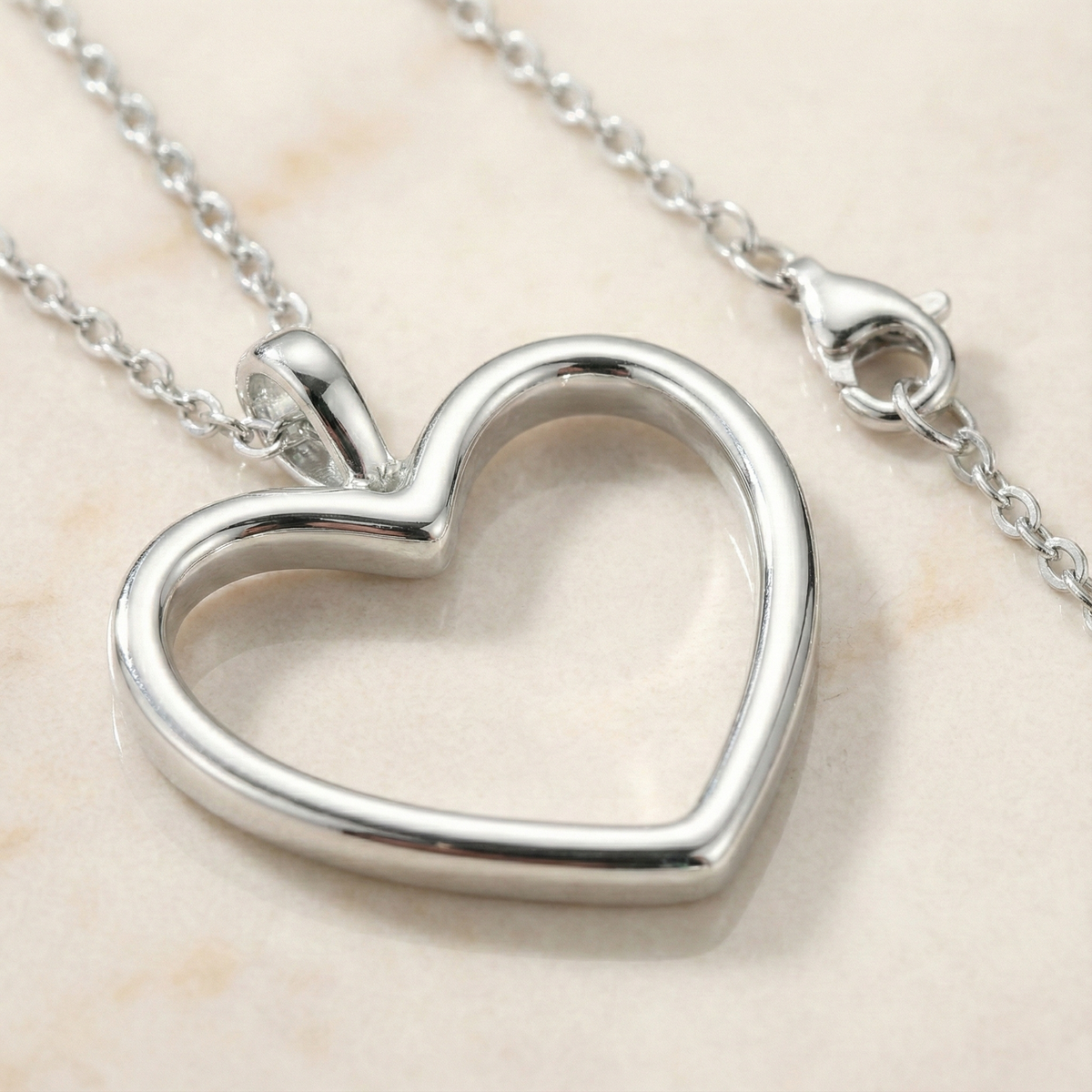 The Amara Sleek Heart | High-Polish Asymmetrical Pendant