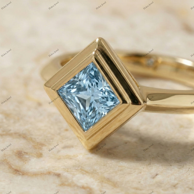 The Azure Kite | 1.00ct Fancy Blue Princess Cut Diamond Geometric Solitaire Ring in 18k Yellow Gold
