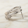 the-cognac-loop-graduated-champagne-diamond-cluster-earrings