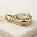 the-ethereal-drop-pear-cut-open-frame-solitaire-pendant