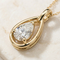 the-ethereal-drop-pear-cut-open-frame-solitaire-pendant