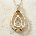 the-ethereal-drop-pear-cut-open-frame-solitaire-pendant