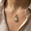 the-ethereal-drop-pear-cut-open-frame-solitaire-pendant