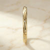 The Helios Twist | Flush Set Diamond Bangle