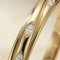 the-helios-twist-flush-set-diamond-bangle