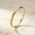 the-helios-twist-flush-set-diamond-bangle