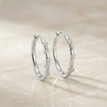 the-stella-station-hoops-scattered-bezel-diamond-earrings