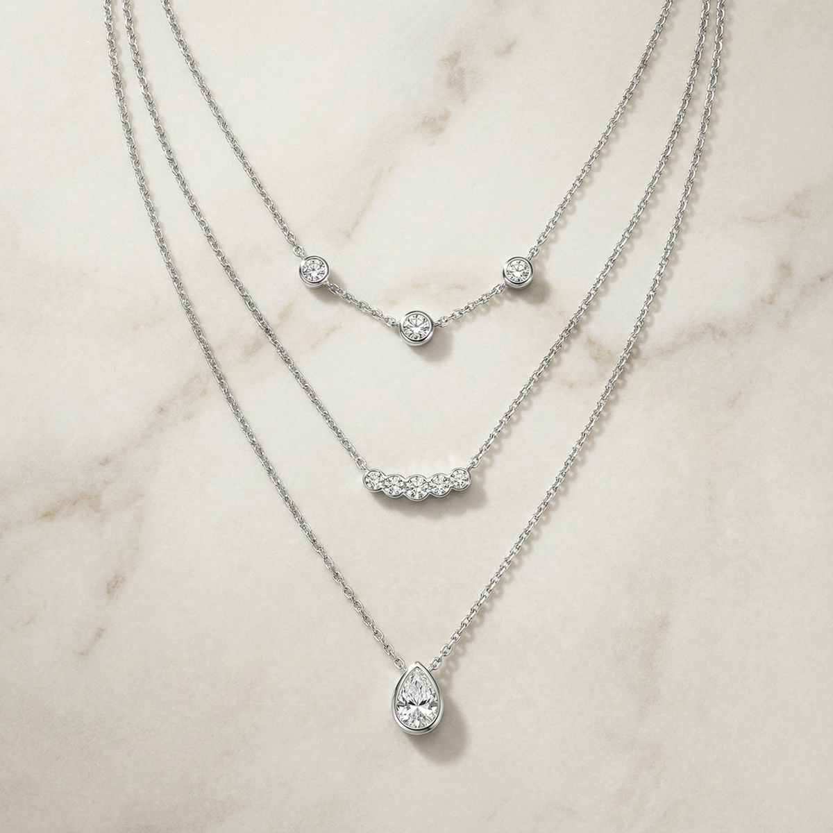 The Trinity Layer | Pear & Round Station Necklace